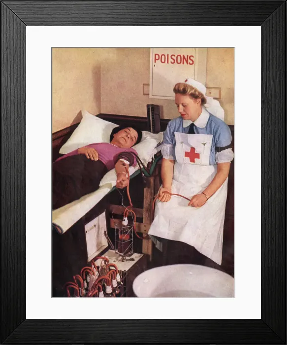 Framed Print : A blood donor at a Civil Defence First-Aid Station Framed Print : A blood donor at a Civil Defence First-Aid Station