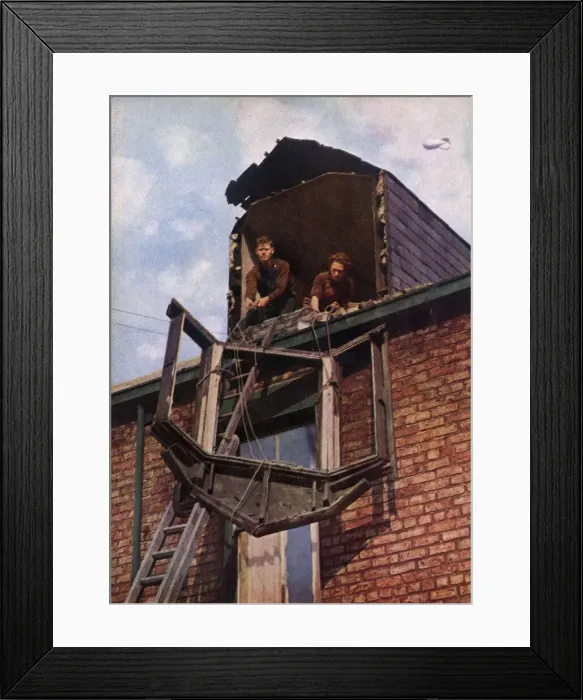 Framed Print : Two workers lowering a window pane Framed Print : Two workers lowering a window pane