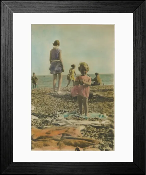 Framed Print : A little girl pictured playing on the beach at Bognor Regis, 1920s. Date: 1920s Framed Print : A little girl pictured playing on the beach at Bognor Regis, 1920s. Date: 1920s