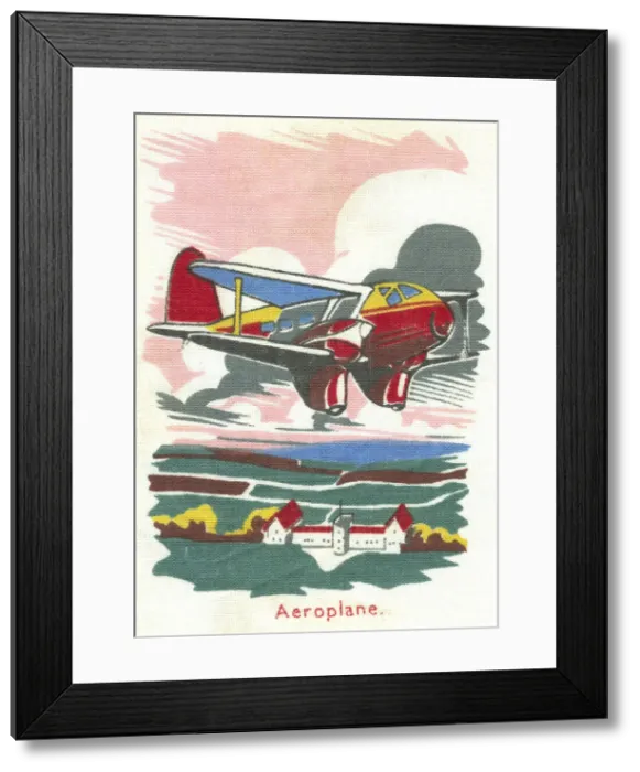 Framed Print : Aeroplane. An twin-engined bi-plane flying over the countryside Framed Print : Aeroplane. An twin-engined bi-plane flying over the countryside