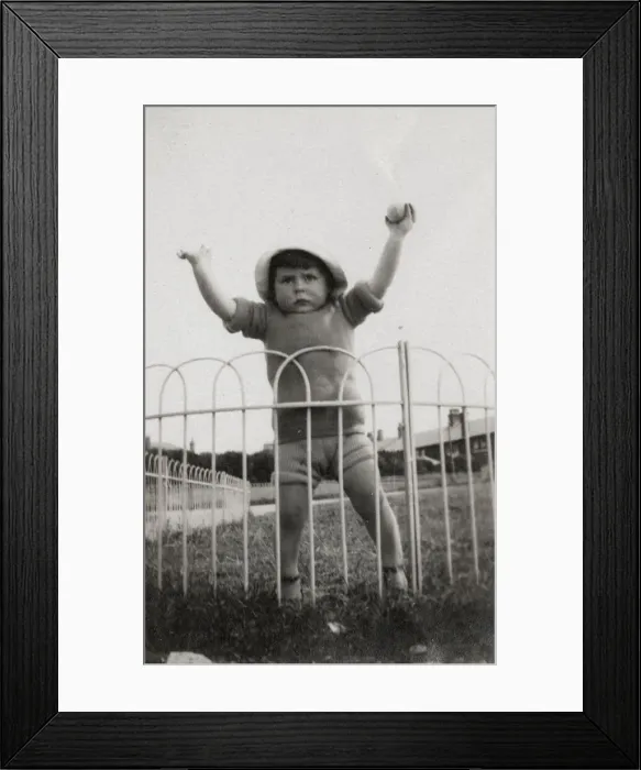 Framed Print : Funny little toddler boy pretending to be a Strongman Framed Print : Funny little toddler boy pretending to be a Strongman