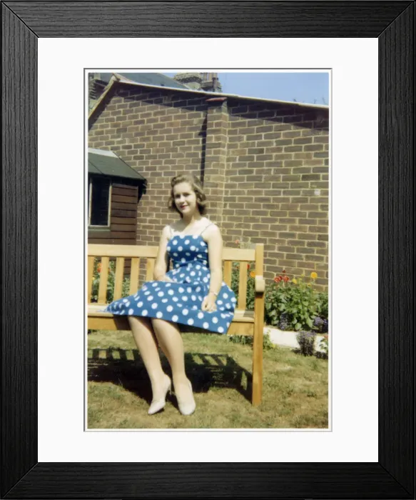 Framed Print : Pretty young lady - blue and white polka dot dress Framed Print : Pretty young lady - blue and white polka dot dress