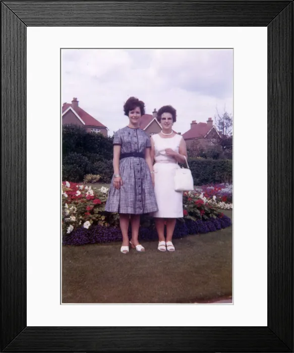 Framed Print : Mother and daughter in pretty suburban back garden Framed Print : Mother and daughter in pretty suburban back garden