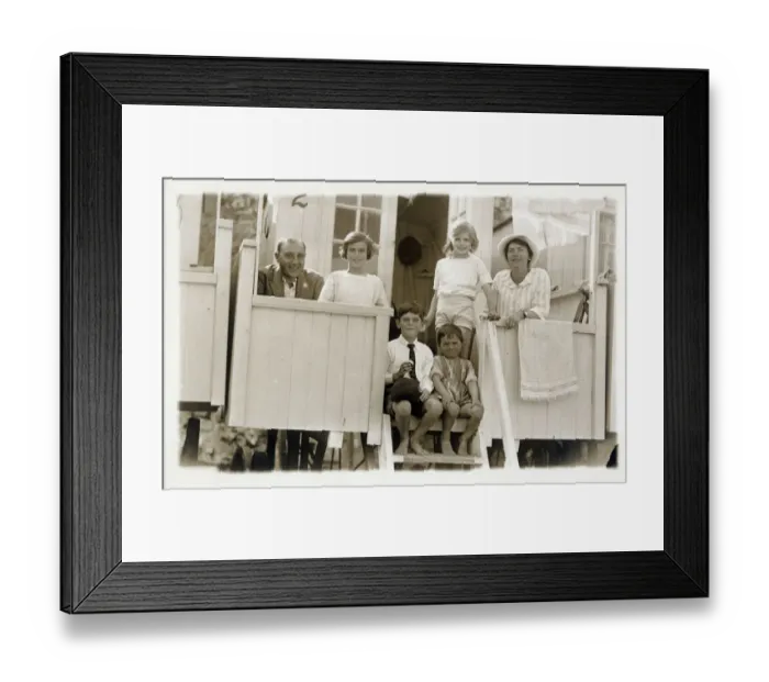 Framed Print : Family outside their beach hut Framed Print : Family outside their beach hut