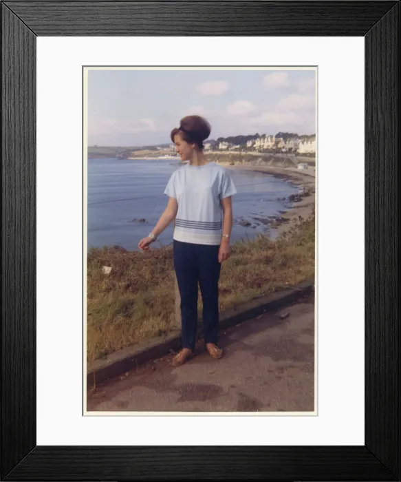 Framed Print : Young lady on holiday - British coastline