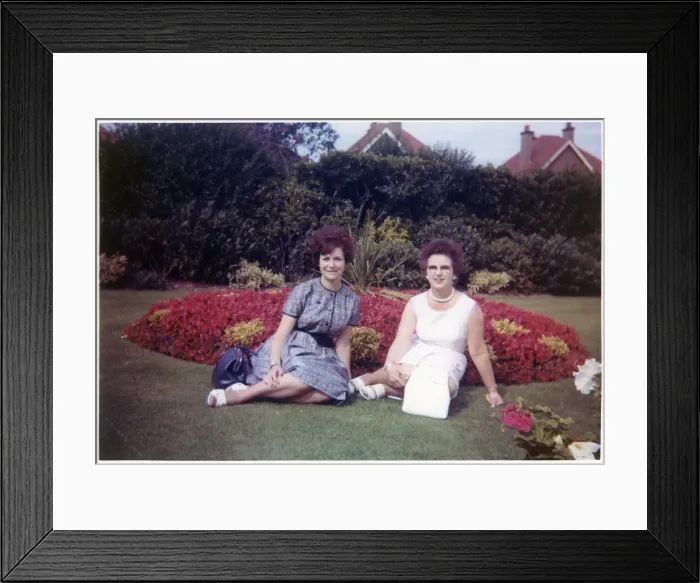 Framed Print : Young woman and her Mother sitting in a formal garden Framed Print : Young woman and her Mother sitting in a formal garden