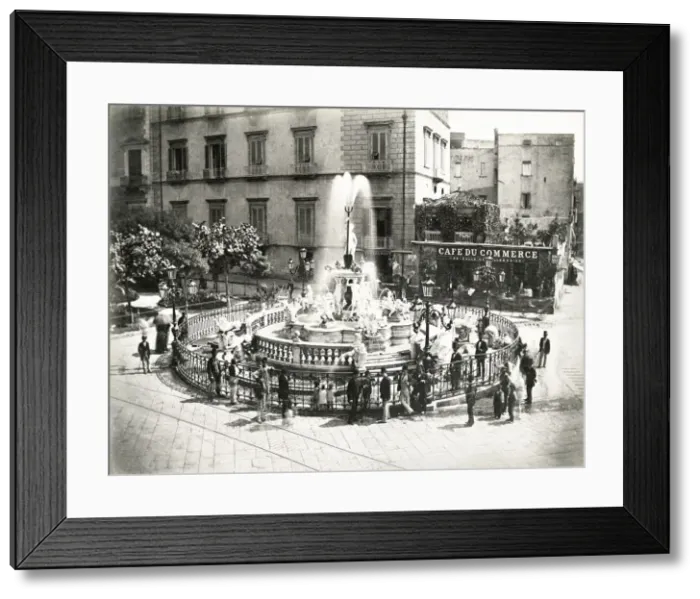 Framed Print : France, crowd aroud the fountain in a town square Framed Print : France, crowd aroud the fountain in a town square