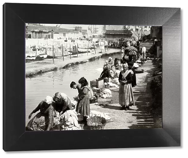Washerwomen washing clothes in a river, Nice, France