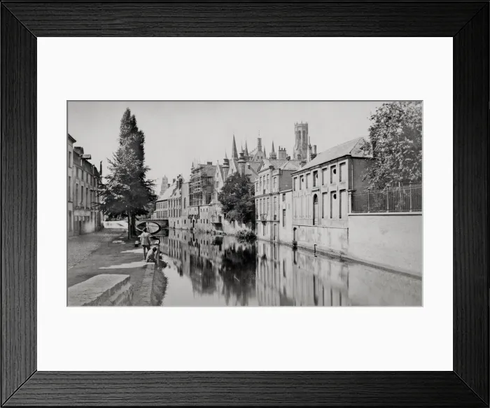 Framed Print : Houses along a canal in the city of Bruges, Belgium Framed Print : Houses along a canal in the city of Bruges, Belgium