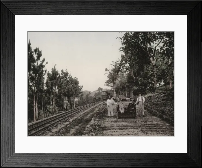 Framed Print : Tourists being pulled on a sledge, Madeira Framed Print : Tourists being pulled on a sledge, Madeira