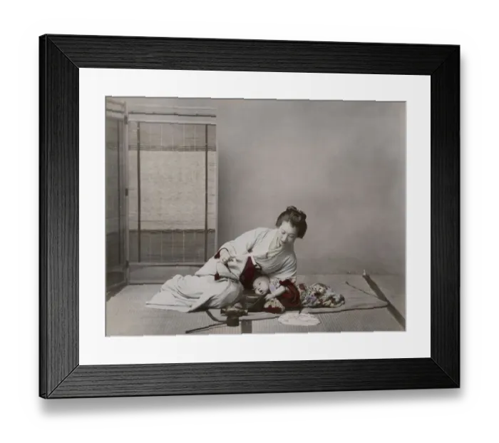Framed Print : Young woman playing with her baby Framed Print : Young woman playing with her baby