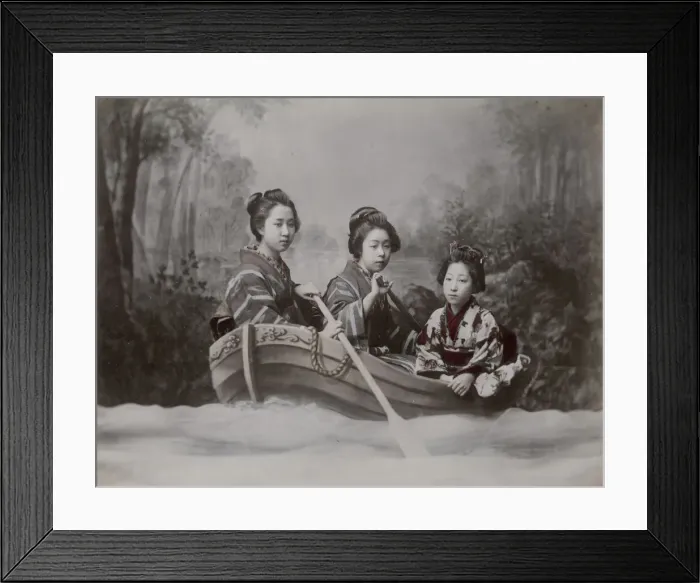 Framed Print : Young women in a rowing boat, studio scene tableau Framed Print : Young women in a rowing boat, studio scene tableau