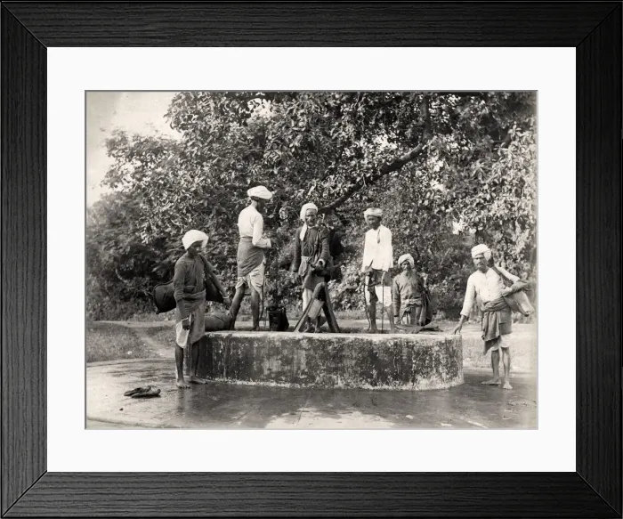 Framed Print : Water carriers filling their skins in a well, India Framed Print : Water carriers filling their skins in a well, India