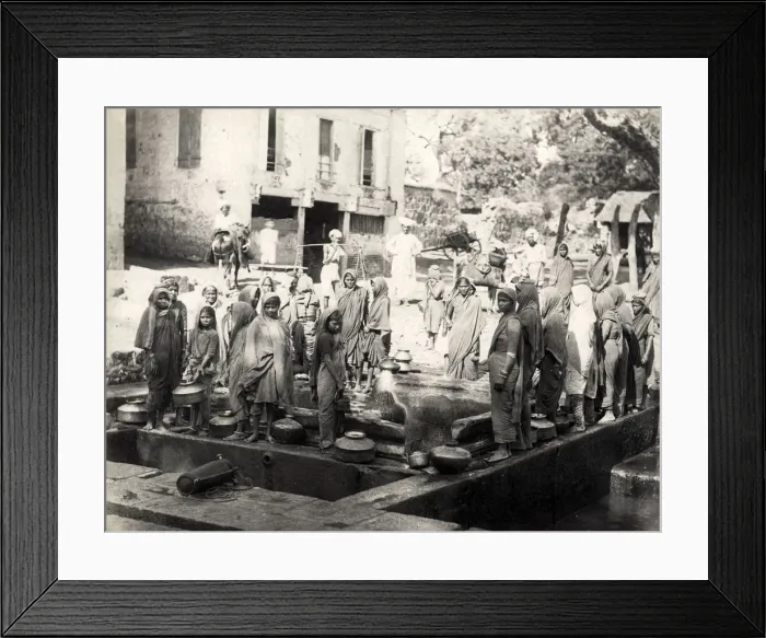 Framed Print : Women collecting water from a well, India Framed Print : Women collecting water from a well, India