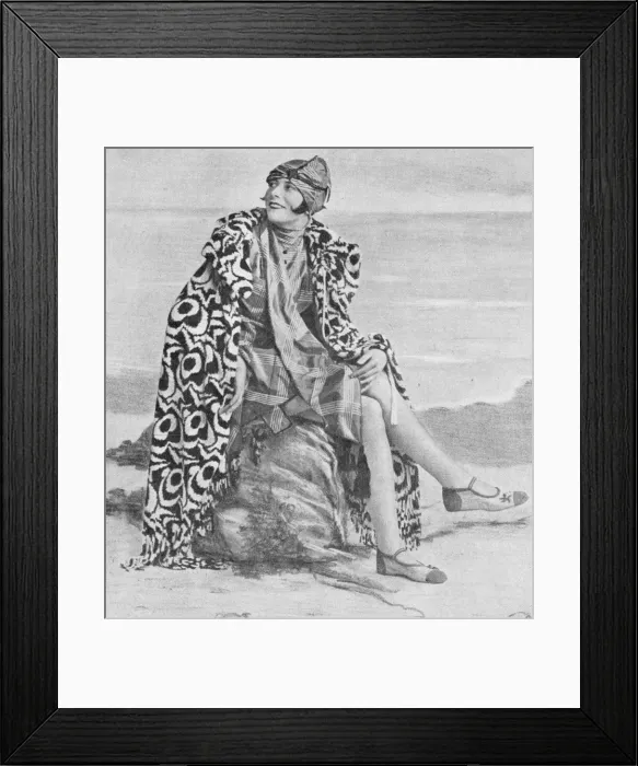 Framed Print : A bathing beauty wearing a bathing suit and wrap Framed Print : A bathing beauty wearing a bathing suit and wrap
