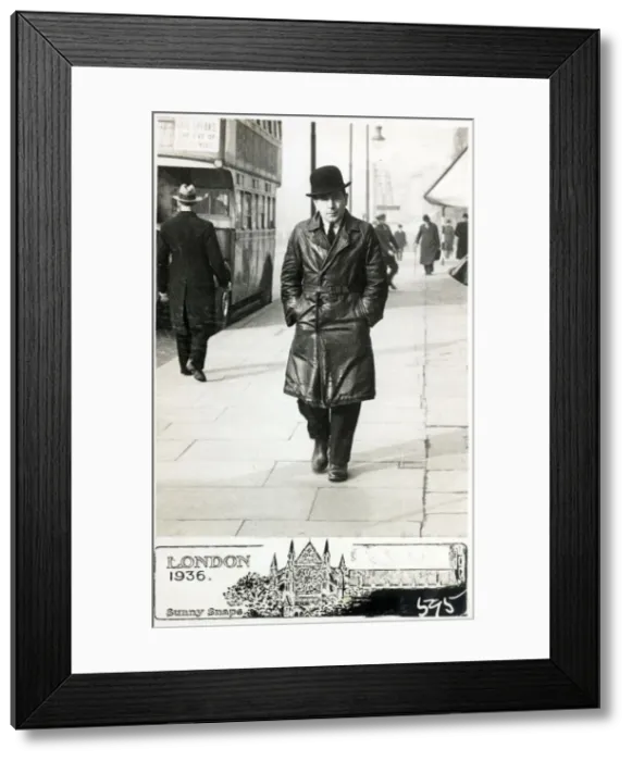 Framed Print : Middle aged in a black leather full length overcoat - Street Framed Print : Middle aged in a black leather full length overcoat - Street