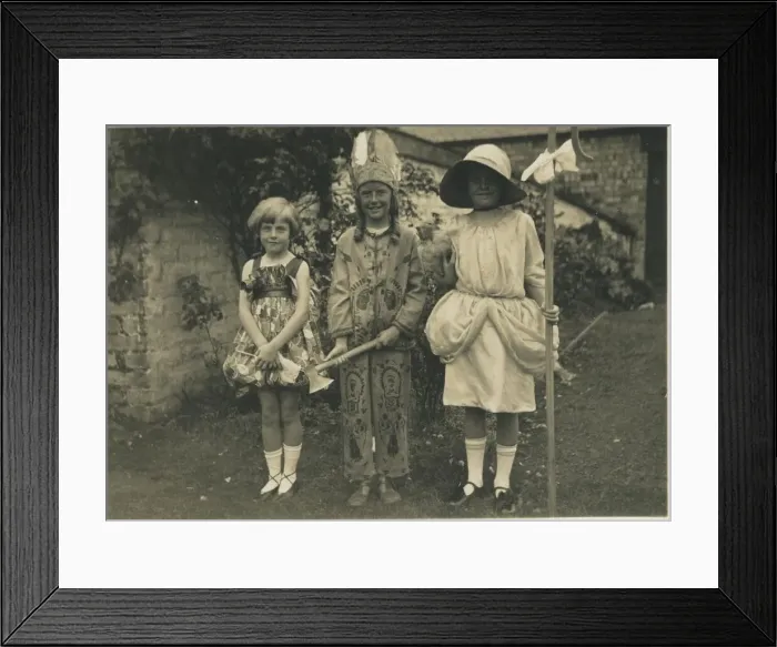 Framed Print : Three children in fancy dress, one as Little Bo-Peep, another as a Native American Framed Print : Three children in fancy dress, one as Little Bo-Peep, another as a Native American