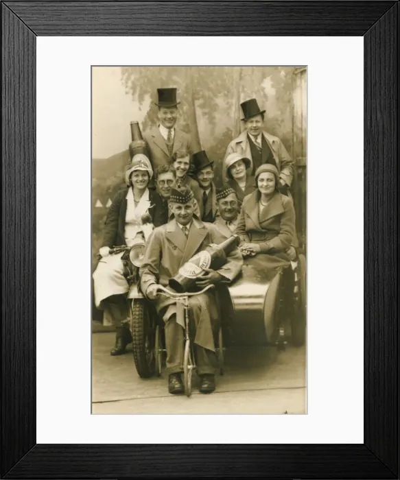 Framed Print : A jolly group of holidaymakers pose for a photograph with prop beer bottle Framed Print : A jolly group of holidaymakers pose for a photograph with prop beer bottle