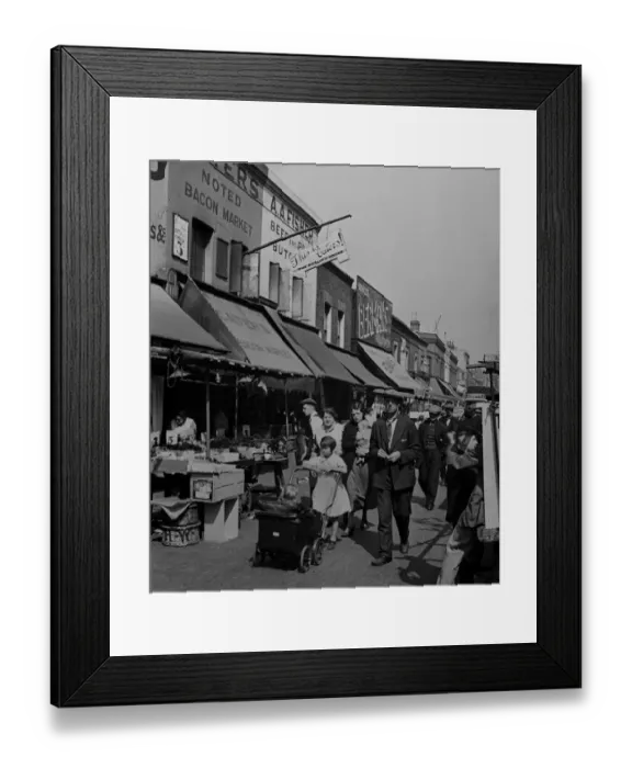 Framed Print : A family shopping in Whitechapel Market Framed Print : A family shopping in Whitechapel Market