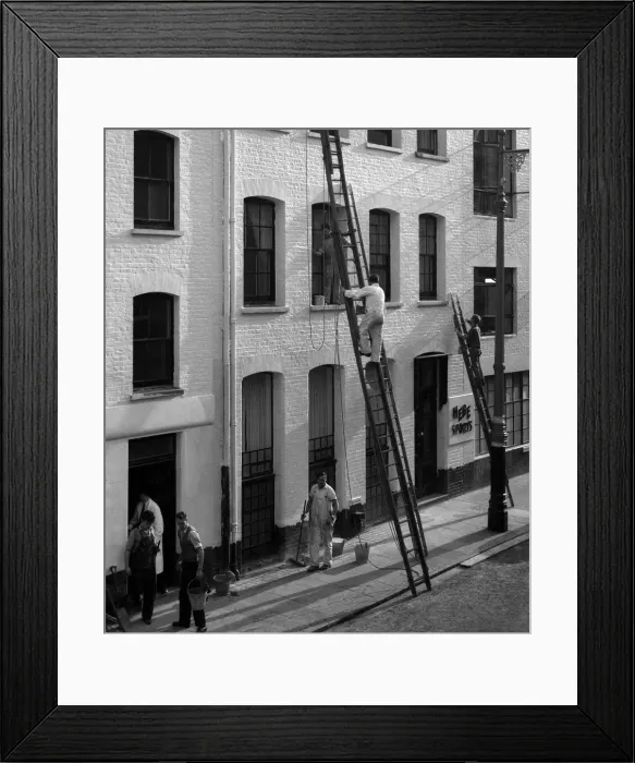Framed Print : Decorating an office building, London Framed Print : Decorating an office building, London
