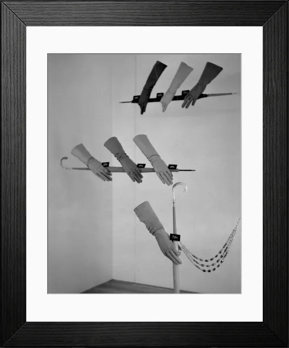 Framed Print : Display of gloves in fashion retailers window, London
