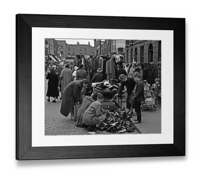Framed Print : Family sorting shoes in Berwick Street Market, London Framed Print : Family sorting shoes in Berwick Street Market, London