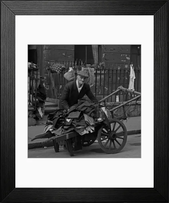 Framed Print : Selling second hand clothes from a barrow, London Framed Print : Selling second hand clothes from a barrow, London