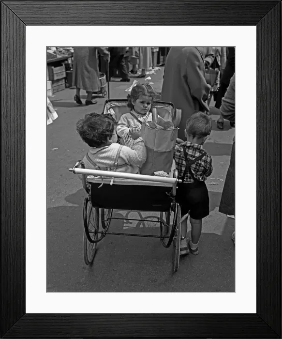 Framed Print : Small children and pram, Whitechapel Market, London Framed Print : Small children and pram, Whitechapel Market, London
