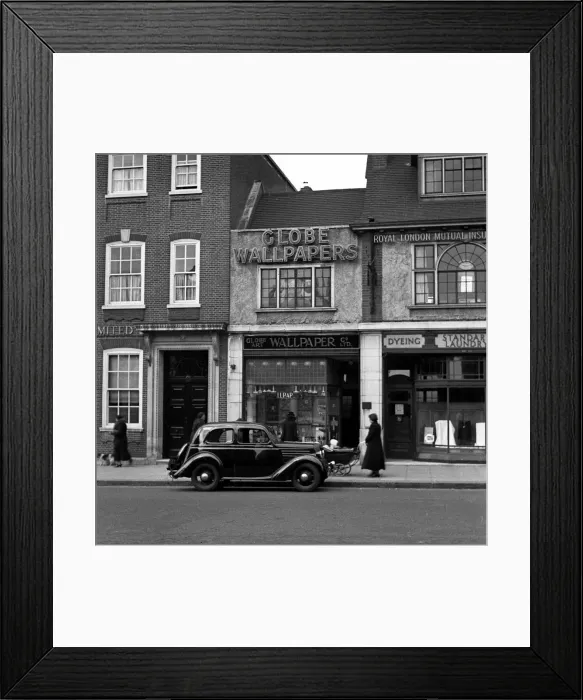 Framed Print : Street scene with wallpaper shop and laundry Framed Print : Street scene with wallpaper shop and laundry
