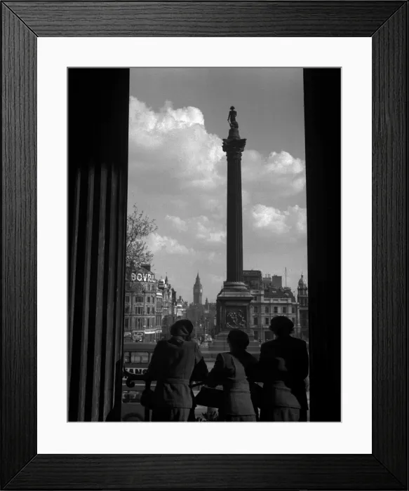 Framed Print : Women look out on Trafalgar Square, London Framed Print : Women look out on Trafalgar Square, London