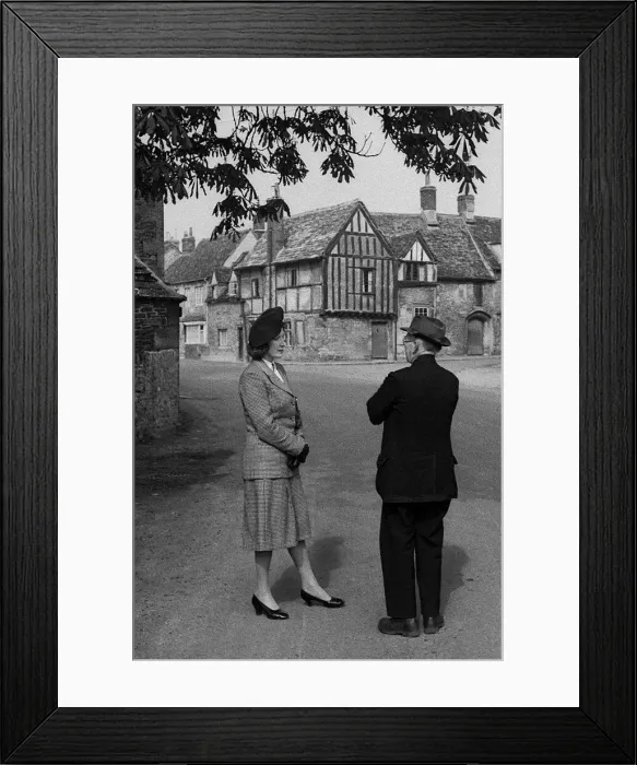 Framed Print : Man and woman chatting, Cotswolds, England Framed Print : Man and woman chatting, Cotswolds, England