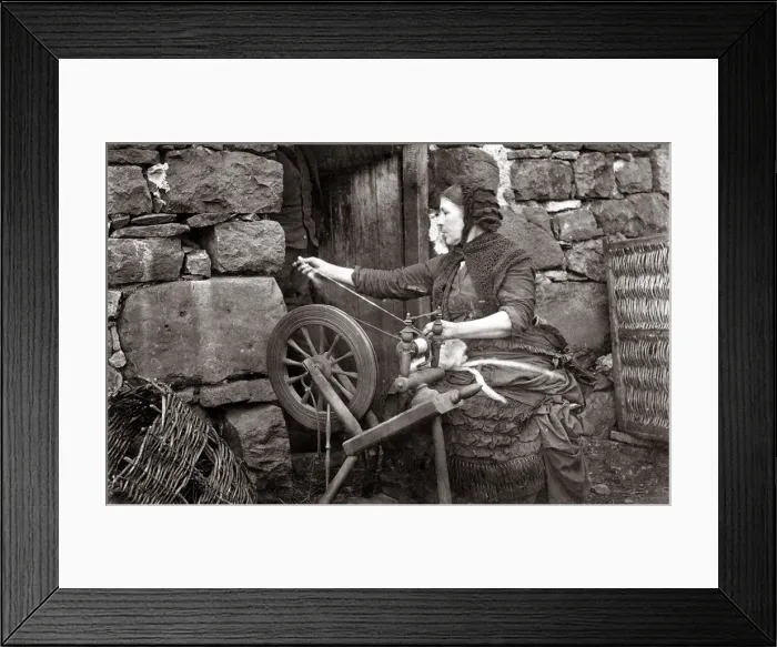 Framed Print : c. 1880s Scotland - woman spinning wool on a spinning wheel Framed Print : c. 1880s Scotland - woman spinning wool on a spinning wheel