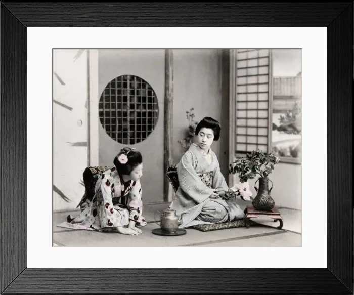 Framed Print : c. 1880s Japan - geishas with tea pot and flowers Framed Print : c. 1880s Japan - geishas with tea pot and flowers