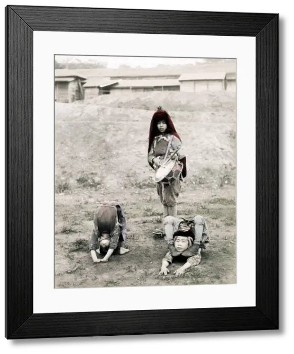 Framed Print : c. 1880s Japan - street performers, acrobats Framed Print : c. 1880s Japan - street performers, acrobats