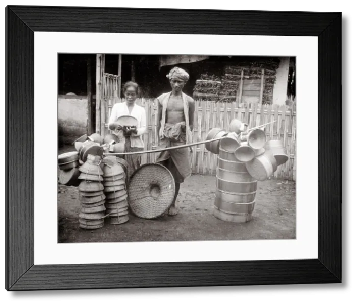 Framed Print : Street vendor Batavia Indonesia with pots and baskets Framed Print : Street vendor Batavia Indonesia with pots and baskets