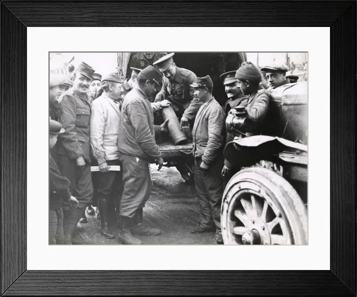 Framed Print : WWI: howitzer shells being looked at by French civilians Framed Print : WWI: howitzer shells being looked at by French civilians