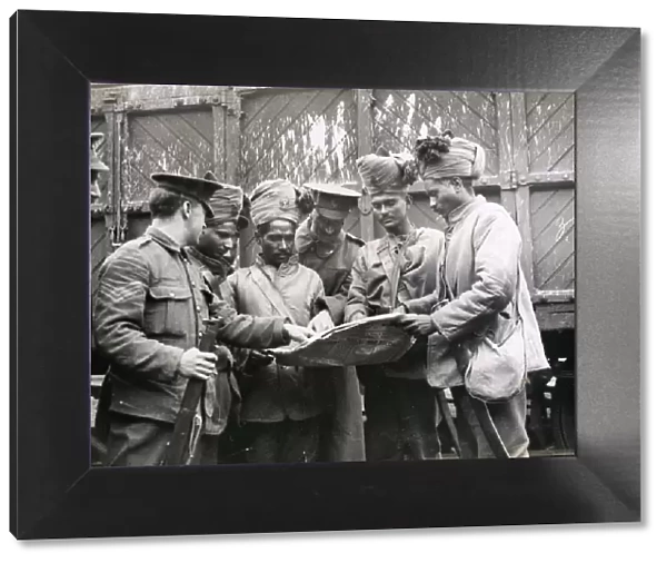 WWI: Indian colonial soldiers examine a map