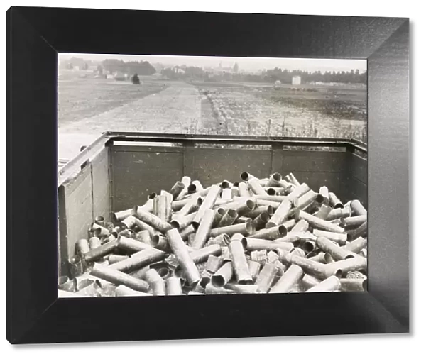 WWI: railway truck full of shell cases