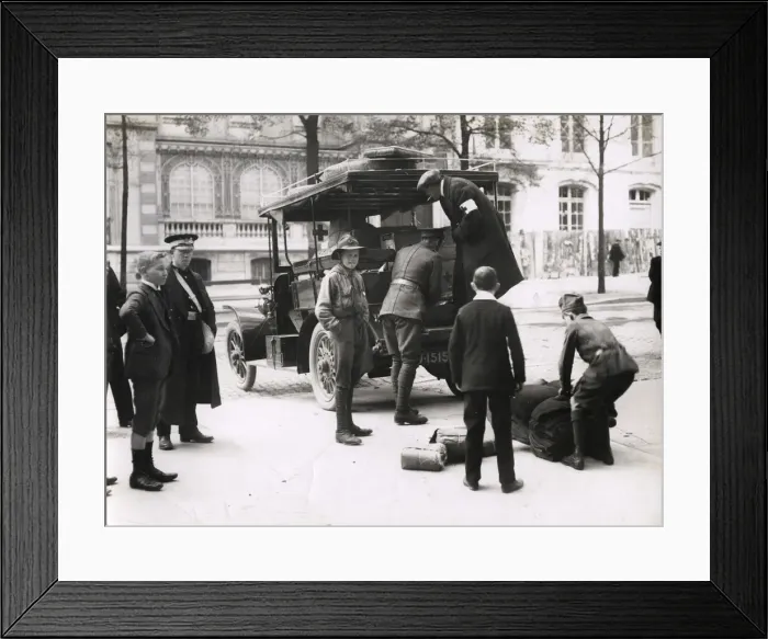 Framed Print : WWI: unloading Red Cross supplies from a car, Paris Framed Print : WWI: unloading Red Cross supplies from a car, Paris