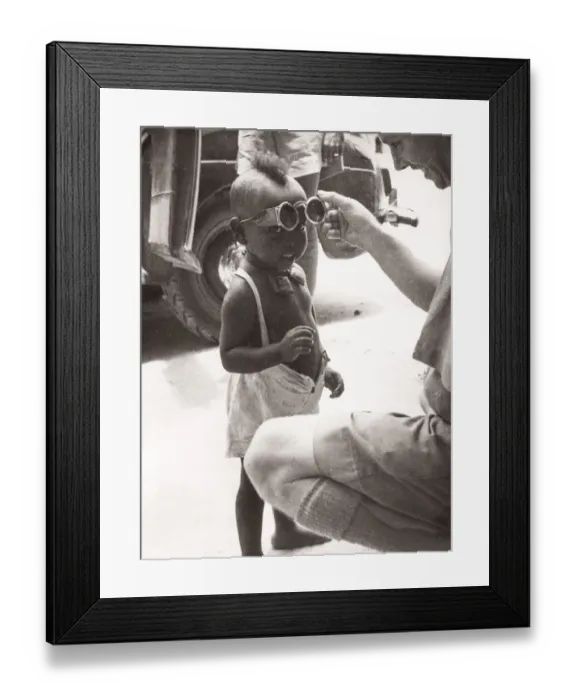 Framed Print : 1940s East Africa - young Somali boy with glasses Framed Print : 1940s East Africa - young Somali boy with glasses