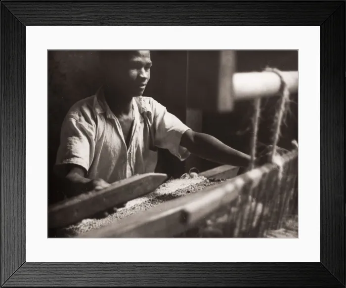 Framed Print : 1940s East Africa - hand loom and weaver at work Framed Print : 1940s East Africa - hand loom and weaver at work