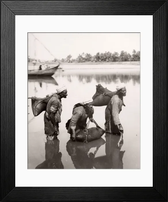 Framed Print : Water carriers filling bags in the River Nile, Egypt, c. 1880 s Framed Print : Water carriers filling bags in the River Nile, Egypt, c. 1880 s