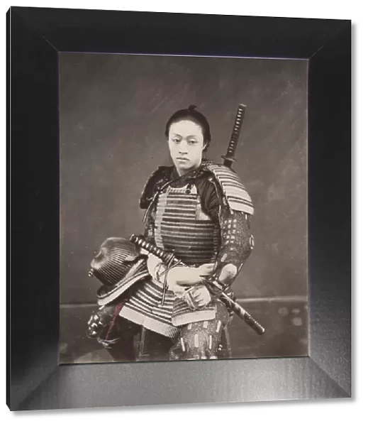 Young samurai with armour and two swords, Japan