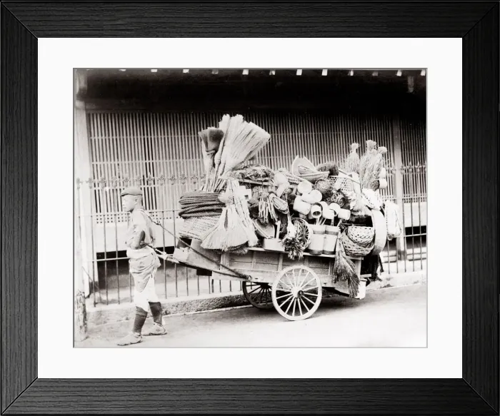 Framed Print : c. 1880s Japan - street vendor pulling his cart Framed Print : c. 1880s Japan - street vendor pulling his cart