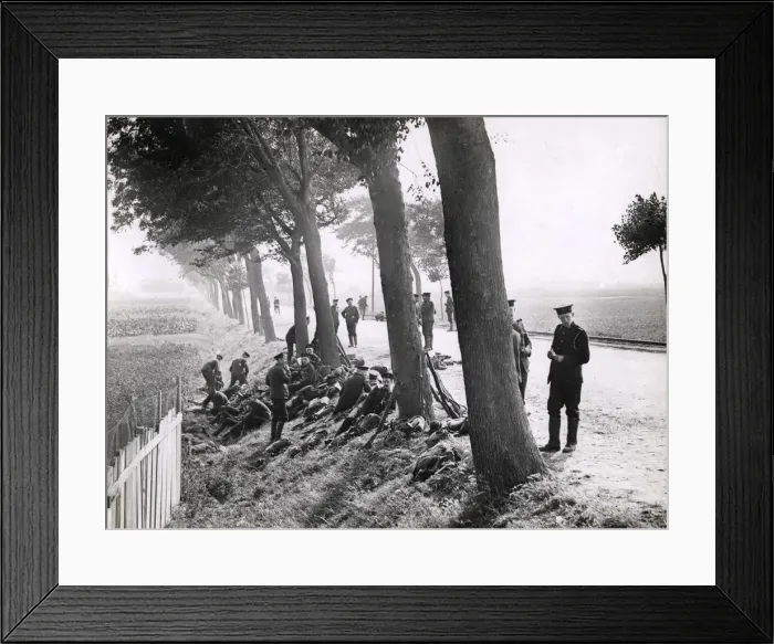 Framed Print : WWI: British Royal Marines resting by roadside near Ostend Framed Print : WWI: British Royal Marines resting by roadside near Ostend