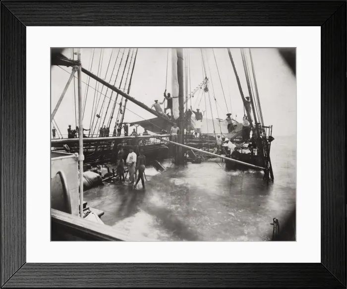 Framed Print : Ship taking on water and sinking, likely China region Framed Print : Ship taking on water and sinking, likely China region
