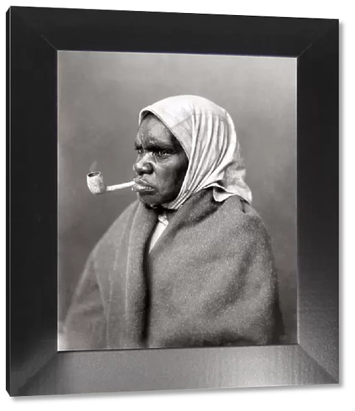 Aboriginal woman smoking a pipe, Australia, c. 1890