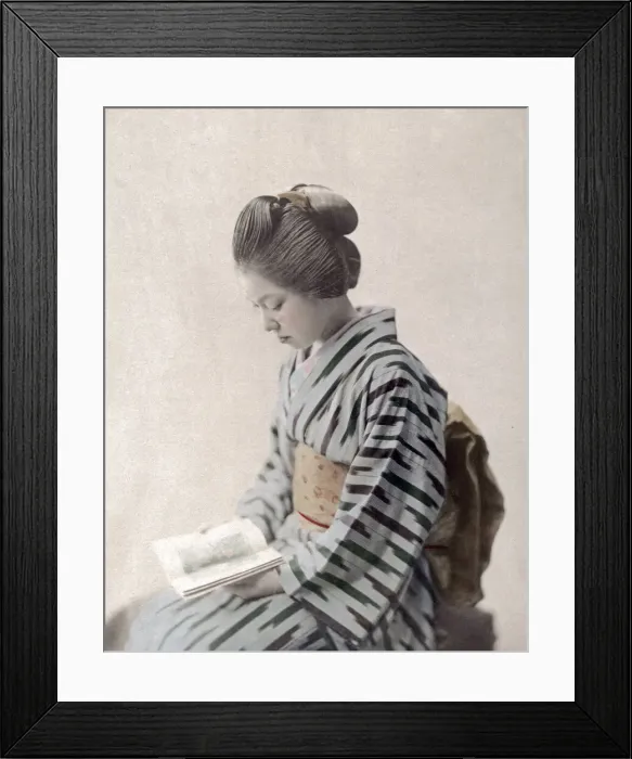 Framed Print : c. 1880s Japan - geisha reading a book Framed Print : c. 1880s Japan - geisha reading a book