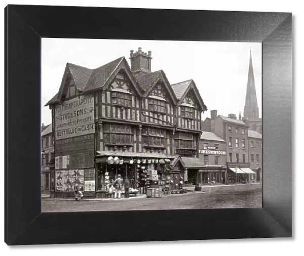 Busy shopfront, English town, c. 1880 s