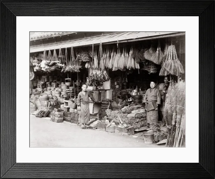 Framed Print : c. 1880s Japan - shop selling brroms, baskets, rope Framed Print : c. 1880s Japan - shop selling brroms, baskets, rope